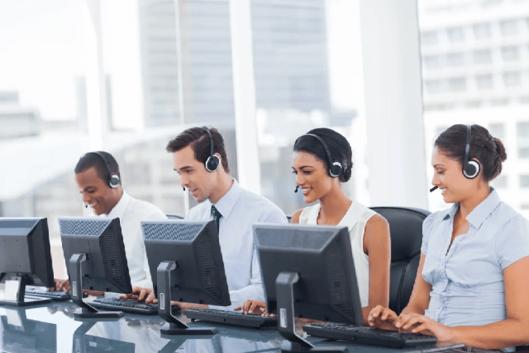 A smiling row of customer service representatives.